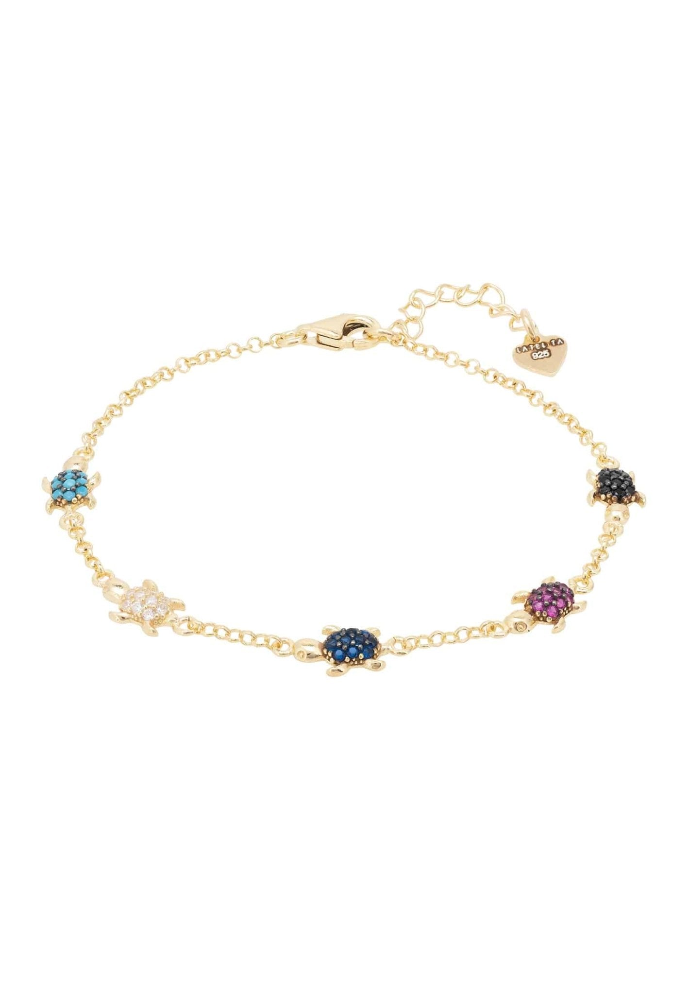 Gold turtles bracelet features five small turtles set in a row along a chain, each tiny turtle is adorned with different coloured zirconia, one black, one pink, one dark blue, one white and one&nbsp;turquoise, which sparkle in the light.