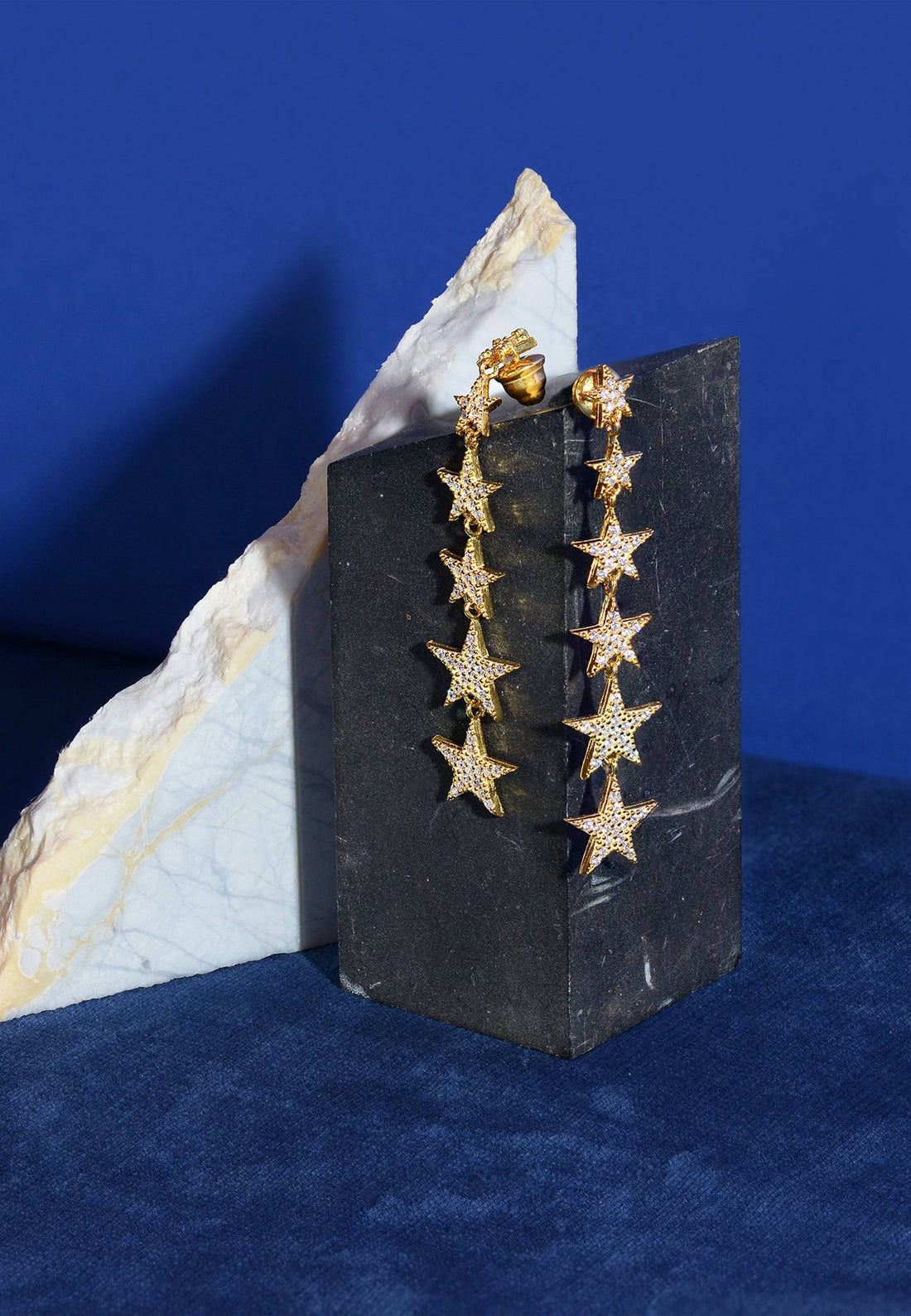 Graduated Star Drop Earrings Gold