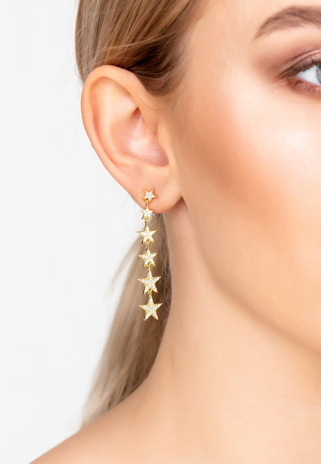 Graduated Star Drop Earrings Gold